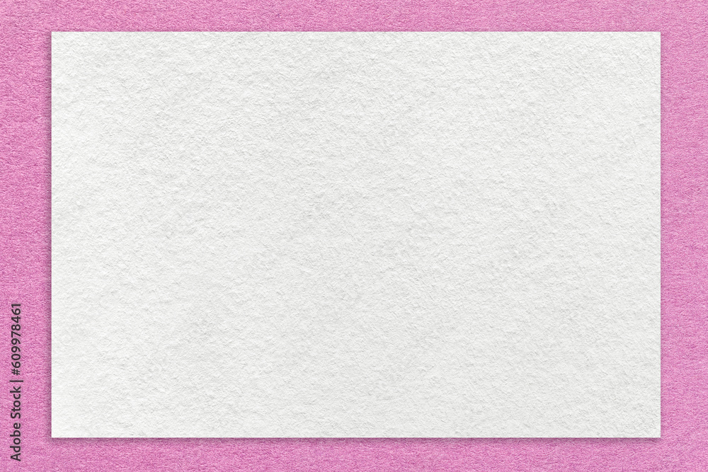 Texture of craft white color paper background with lilac border, macro. Structure of vintage dense kraft pink cardboard Texture of craft white color paper background with lilac border, macro. Structure of vintage dense kraft pink cardboard