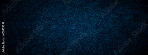 Dark blue broad and wall grunge background texture with black vignette in old vintage textured border design.