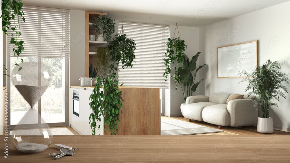 Wooden table or shelf with crystal hourglass measuring the passing time over minimal kitchen and living room with sofa, house plant interior design, copy space background Wooden table or shelf with crystal hourglass measuring the passing time over minimal kitchen and living room with sofa, house plant interior design, copy space background
