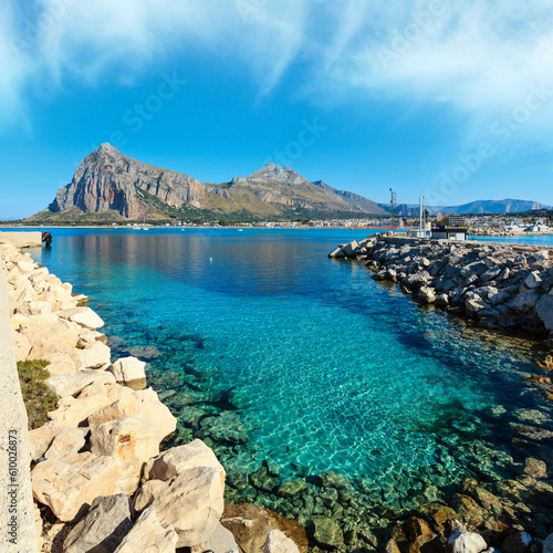 Fototapeta Naklejka Na Ścianę i Meble -  San Vito lo Capo beach with clear azure water and Monte Monaco in far, north-western Sicily, Italy. People unrecognizable.