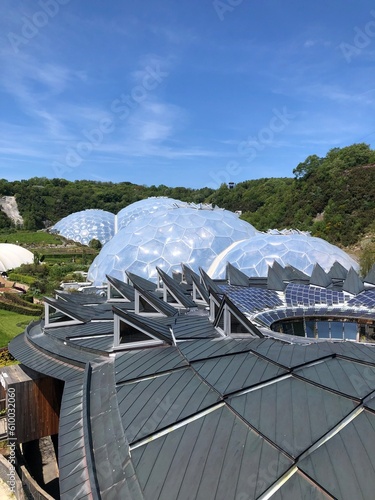 Eco-park of the Eden Project view of the biomes and the roof of the Core building, Cornwall, England, UK. The rooftop of the CORE, Information Centre for the Eden Project photo