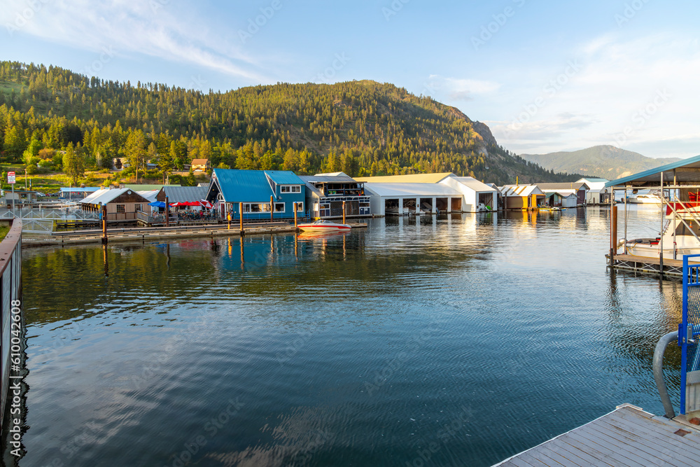 Naklejka premium The main marina district of cafes, boathouses,docks and float homes at the scenic bay on Lake Pend Oreille in the North Idaho town of Bayview, Idaho.
