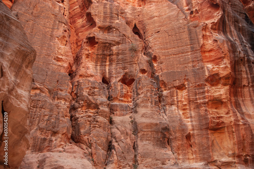 Jordan. Peter. Canyon Siq or El Siq. Sheer cliffs of a canyon or rocky cleft, 92 to 182 meters high, hang over narrow path. Only road to rock city of Nabatean kingdom, to ancient city of Petra.