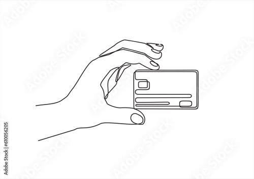 Continuous one line drawing of hand holding credit card. 