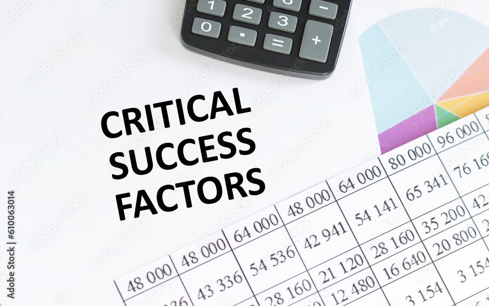 financing availabe text concept. Office workplace table with calculator, graphs, reports and the text CRITICAL SUCCESS FACTORS financing availabe text concept. Office workplace table with calculator, graphs, reports and the text CRITICAL SUCCESS FACTORS