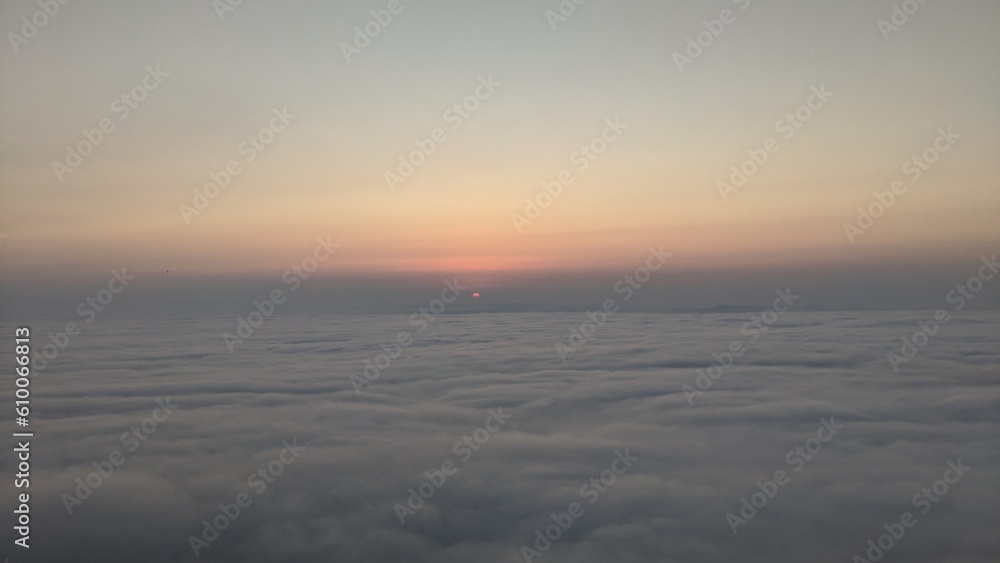 Tranquil Sunset over Dramatic Horizon and Clouds