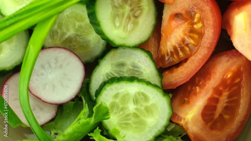 Vegetable salad with fresh vegetables tomato and cucumber and lettuce. close-up.
