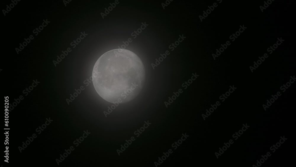 Tokyo, Japan - June 6, 2023: The moon covered with thin clouds
Tokyo, Japan - June 6, 2023: The moon covered with thin clouds