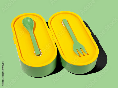 Lunch box and plastic fork, spoon, utensils. Lunchbox container closed