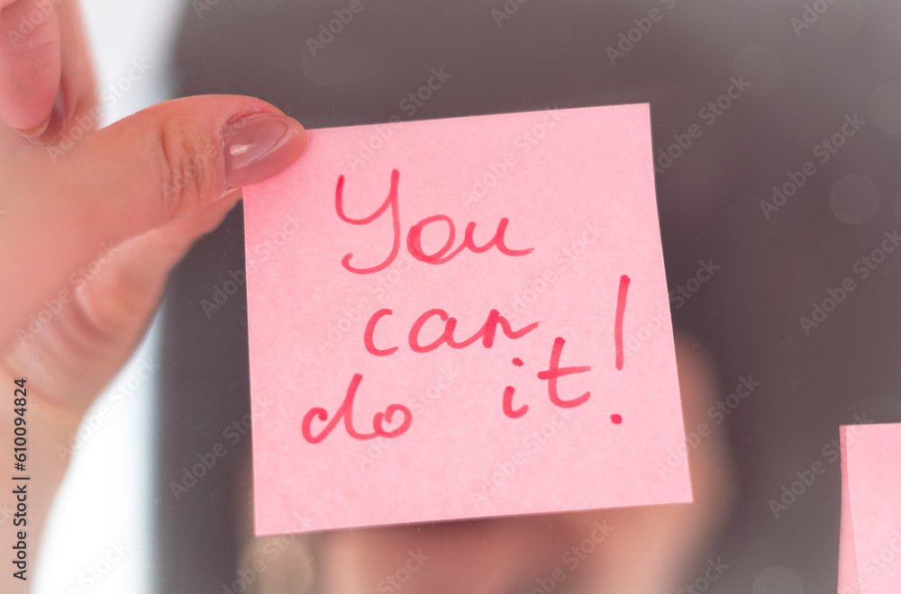 inspirational quotes on pink sticker on the mirror,handwriting text inspirational quotes on pink sticker on the mirror,handwriting text