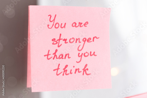 inspirational quotes on pink sticker on the mirror,handwriting text