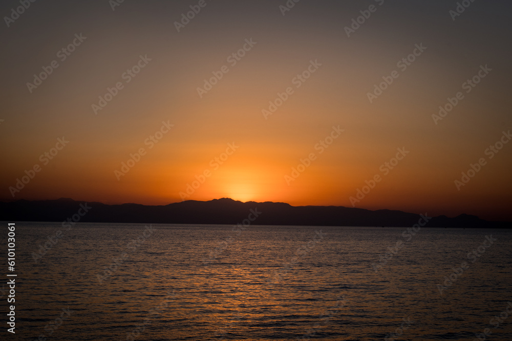 sunset on the sea, amazing view of taurus mountain range sunset on the sea, amazing view of taurus mountain range
