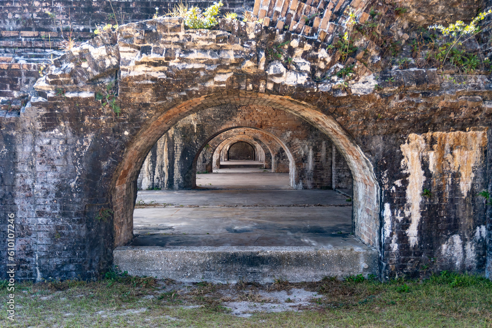 Gulf Islands National Seashore along Gulf of Mexico barrier islands of Florida. Fort Pickens pentagonal historic United States military fort on Santa Rosa Island. Brick casemate arches. 