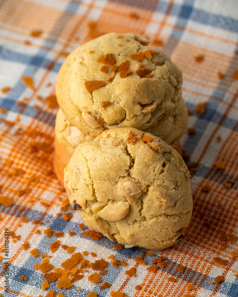 Macadamia nut cookies on a colorful background Macadamia nut cookies on a colorful background