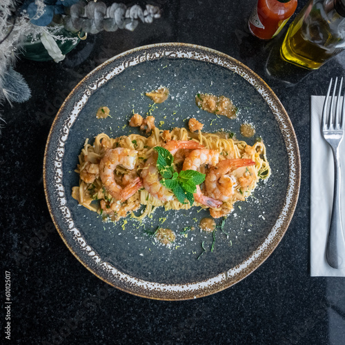A delicious Italian pasta dish with shrimp and seafood. Traditional Italian food