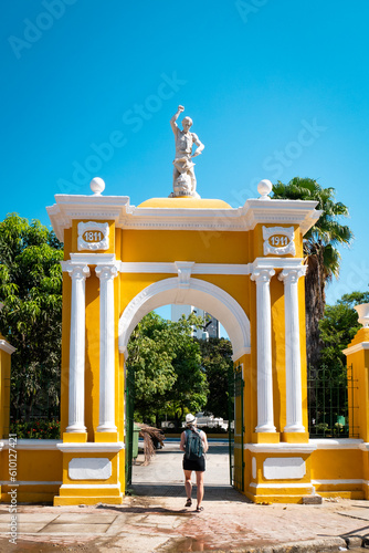 A Female Tourist Enters the Parque Centenario (centenary park) in Cartagena, Colombia