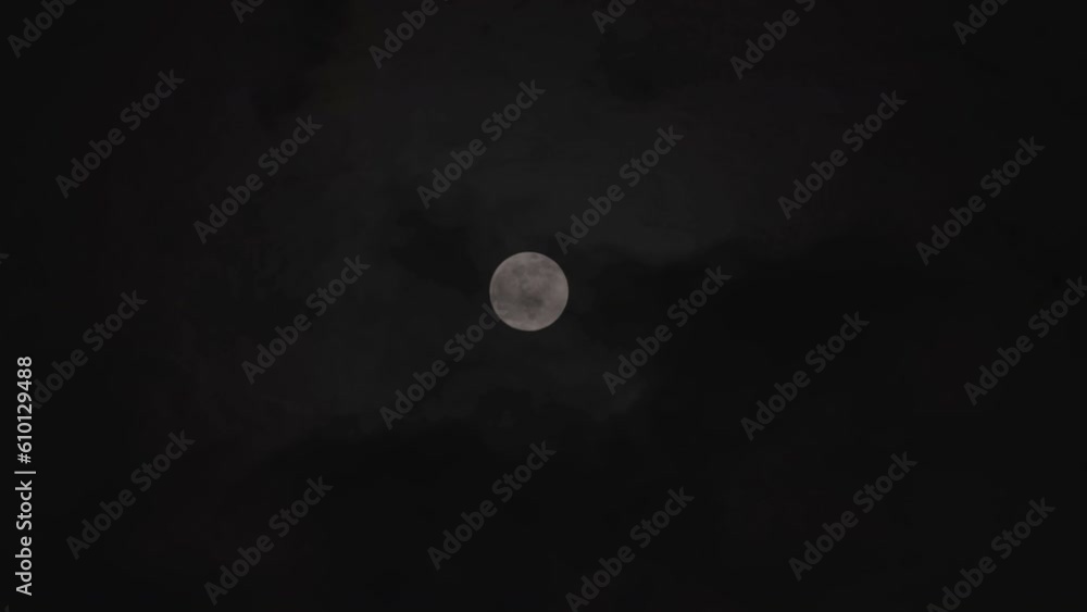 Full Moon in the Sky with Horror Dark Clouds at Night Footage. Full Moon in the Sky with Horror Dark Clouds at Night Footage.