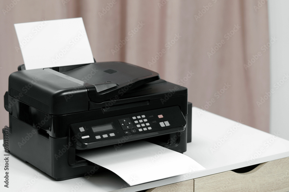Modern printer with paper on white table indoors, space for text Modern printer with paper on white table indoors, space for text