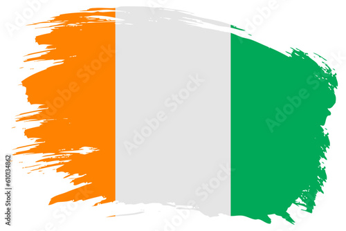 Cote d Ivoire brush stroke flag vector background. Hand drawn grunge style Ivory Coast isolated banner