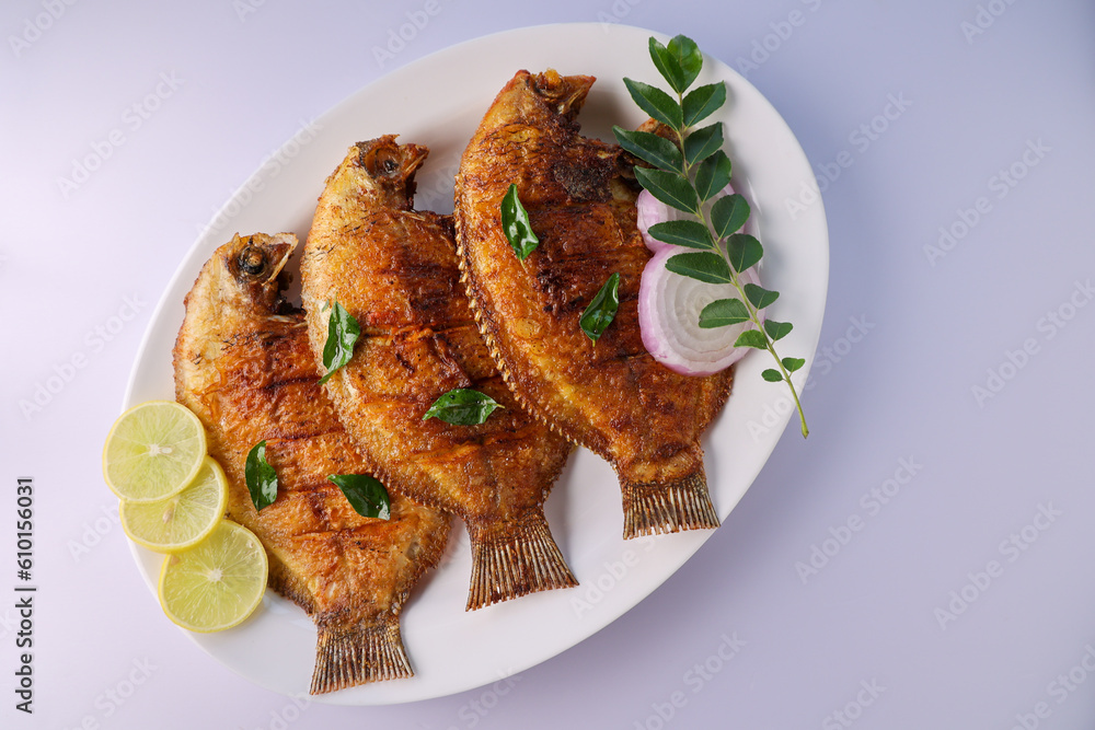 Kerala fish curry Karimeen Pollichathu a popular hot and spicy baked