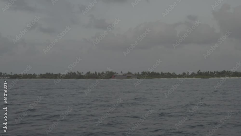 A beautiful bird's eye view of tropical islands in the Maldives. Aerial photography of exotic tropical islands. Footage without color correction. A beautiful bird's eye view of tropical islands in the Maldives. Aerial photography of exotic tropical islands. Footage without color correction.