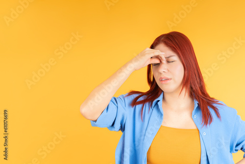 Young woman with migraine
