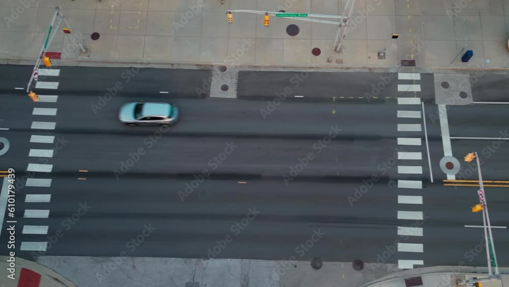 Drone shot cars driving on road through Indianapolis city in America Drone shot cars driving on road through Indianapolis city in America