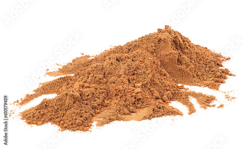 Heap of cinnamon powder isolated on a white background. Ground cinnamon spice.