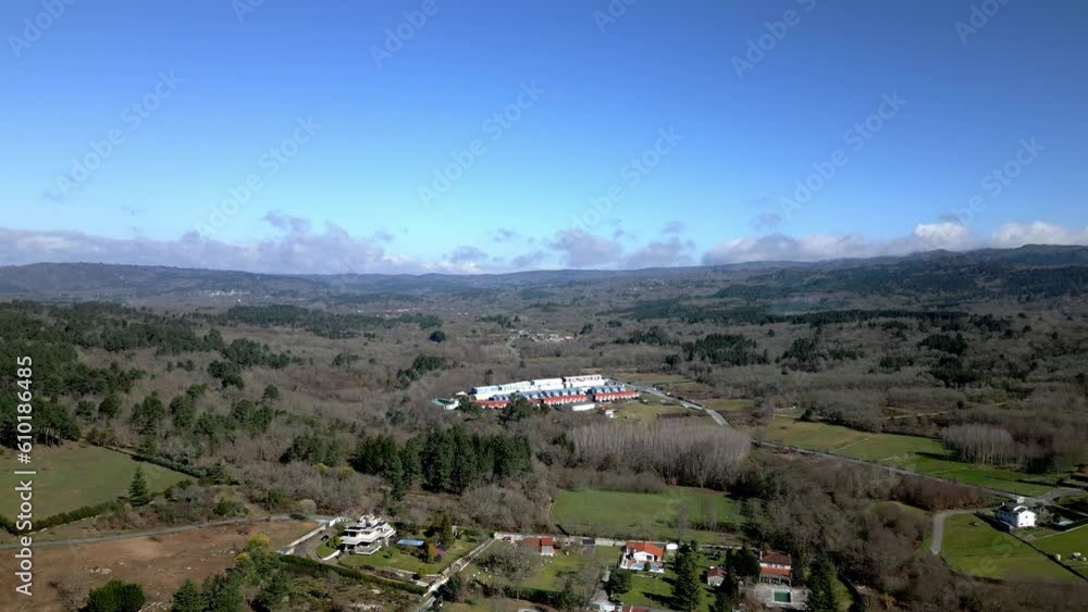 Aerial panoramic overview of outskirts of town in Ourense Spain in forest Aerial panoramic overview of outskirts of town in Ourense Spain in forest