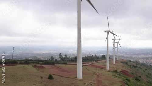 Drone vertical rise revealing Ngong hills, Kenya windmills photo