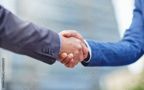 Handshake, city business men and motivation of staff with success, agreement and partnership. Team work, collaboration and deal of businessman with a greeting and welcome hand gesture with partner
