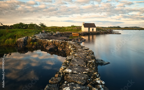 Bild auf Leinwand Beautiful morning landscape scenery with fisherman's hut and old wooden reflecte