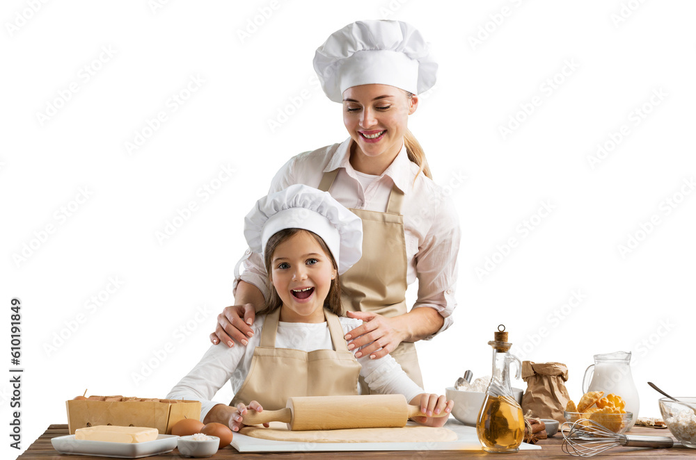 The beautiful young mother and her little daughter cook at home The beautiful young mother and her little daughter cook at home