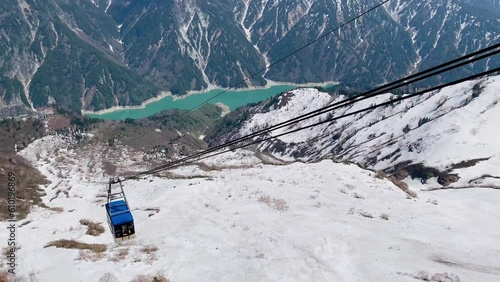 A ropeway cable car coming. The ropeway cable car is a mode of transportation on the Tateyama Kurobe Alpine Line in Japan.