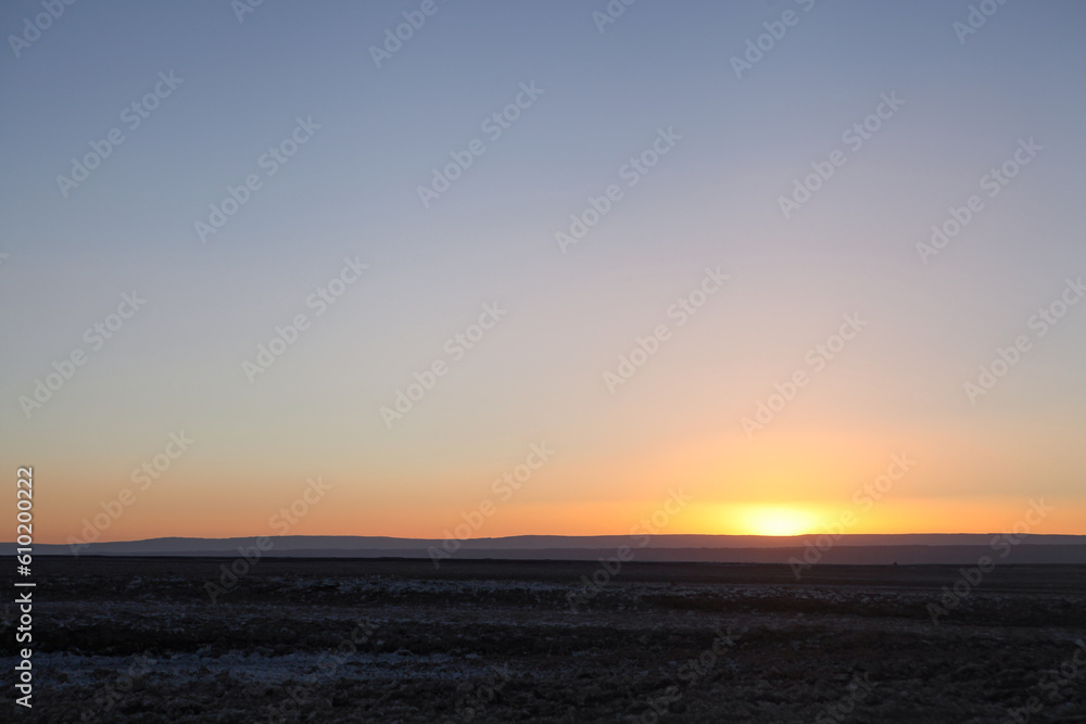 Sun setting over Salar de Atacama in Chile