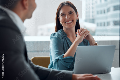 Business meeting, woman and happy with laptop, working in company office, building or teamwork discussion. Female employee, manager or conversation with executive, ceo or feedback from boss
