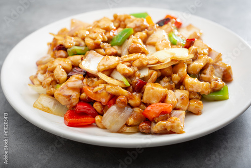 A view of a plate of kung pao chicken.