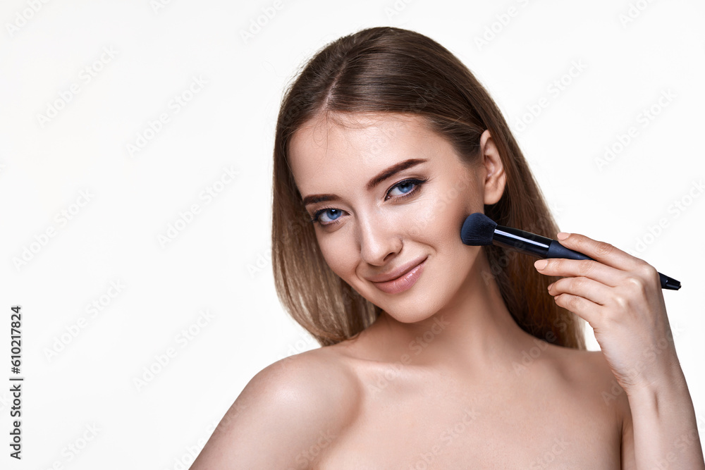 smiling lovely lady posing with make-up brush for powder smiling lovely lady posing with make-up brush for powder