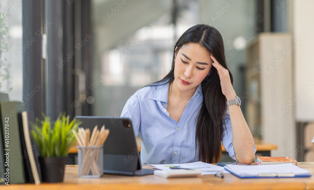 Portrait of tired young business Asian woman work with documents tax laptop computer in office. Sad, unhappy, Worried, Depression, or employee life stress concept
Portrait of tired young business Asian woman work with documents tax laptop computer in office. Sad, unhappy, Worried, Depression, or employee life stress concept
