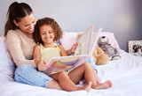 Smile, book and mother with daughter in bedroom for storytelling, fantasy or creative. Education, learning and love with woman reading to young girl in family home for fairytale, literature and relax