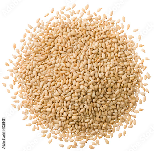 A small heap of roasted white sesame seeds isolated on white background, top view. photo