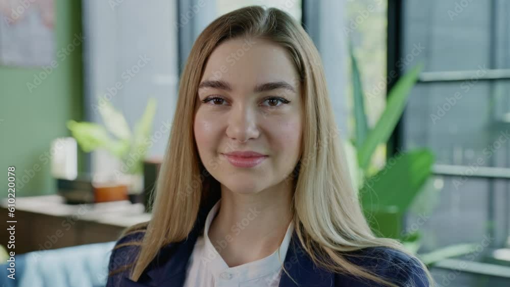 Smiling Young IT Lady Looking at Camera in Office. Portrait of the Young Businesswoman Smiling Young IT Lady Looking at Camera in Office. Portrait of the Young Businesswoman