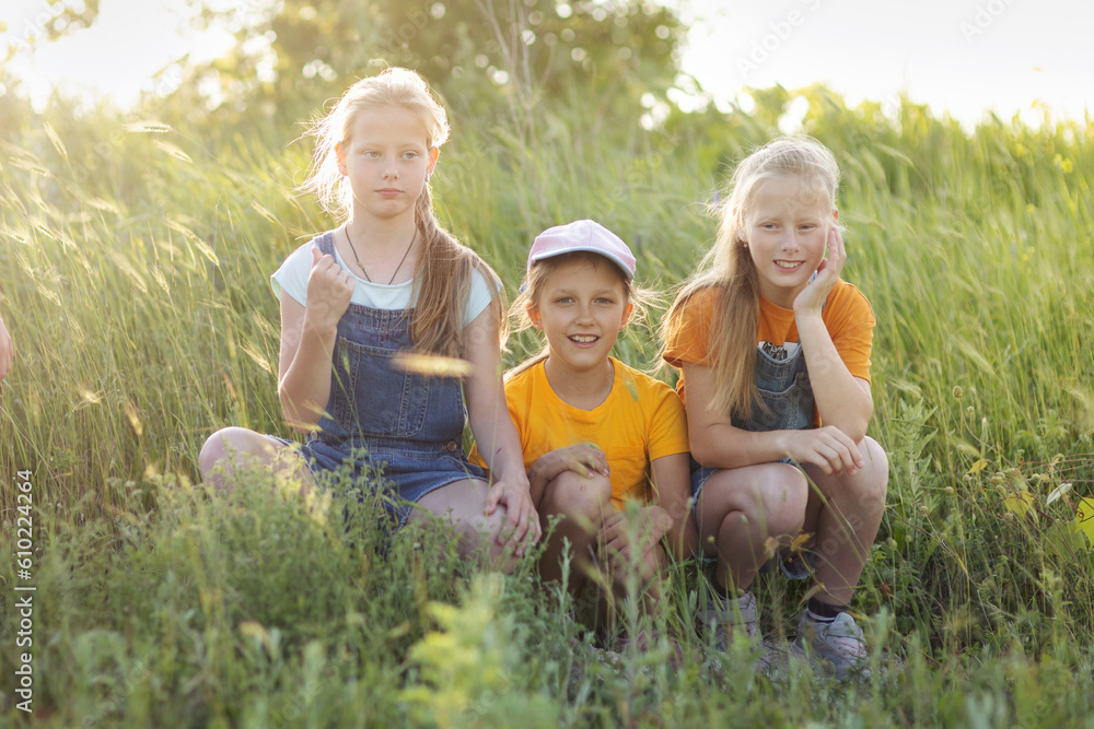children on a walk in the summer children on a walk in the summer