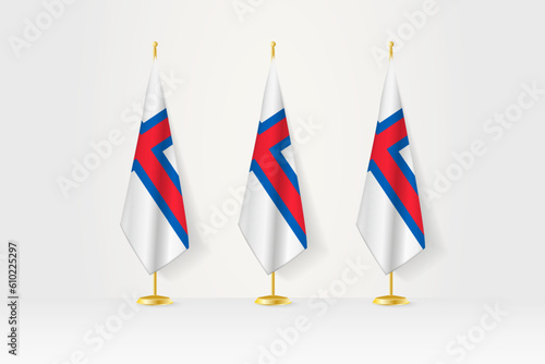 Three Faroe Islands flags in a row on a golden stand, illustration of press conference and other meetings.