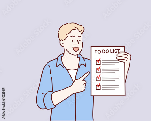 Man holding a notebook with written words To do list. Hand drawn style vector design illustrations.