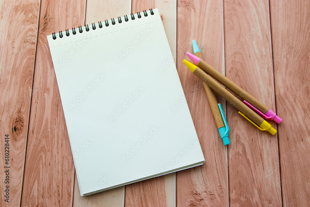 notebook with pens. spiral notepad with colorful pens