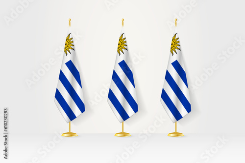 Three Uruguay flags in a row on a golden stand, illustration of press conference and other meetings.