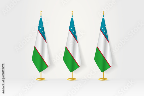Three Uzbekistan flags in a row on a golden stand, illustration of press conference and other meetings.