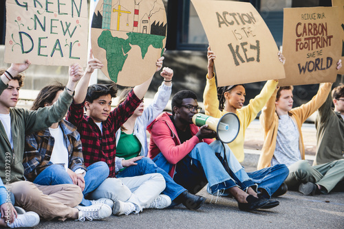 Group of young activists against land exploitation and climate change exercise the right to protest and make a sit in