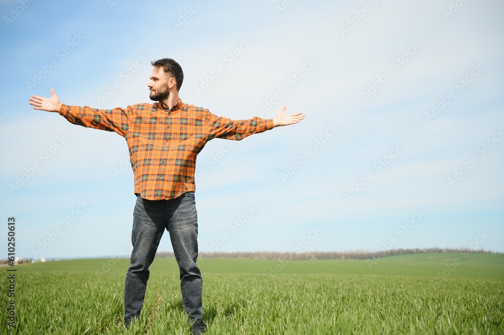 Portrait of farmer standing in field. Portrait of farmer standing in field.